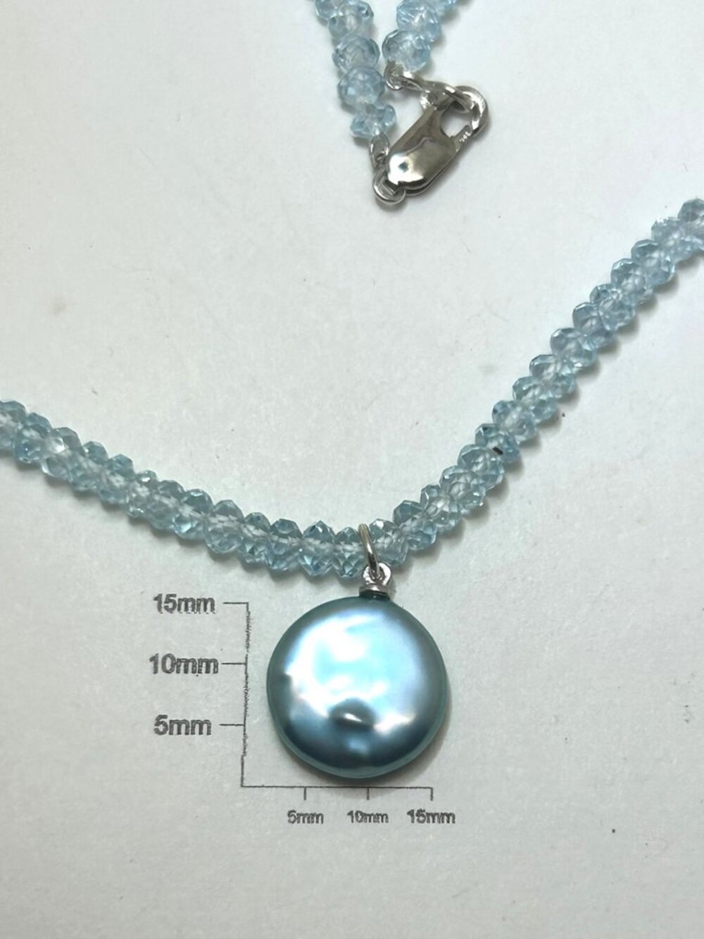 Faceted Blue Topaz Freshwater Pearl Necklace.